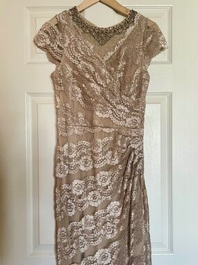 Evening gown with lace overlay and beaded neckline